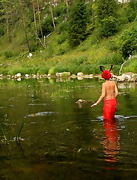 With Horns In Red Dress In Shallow River